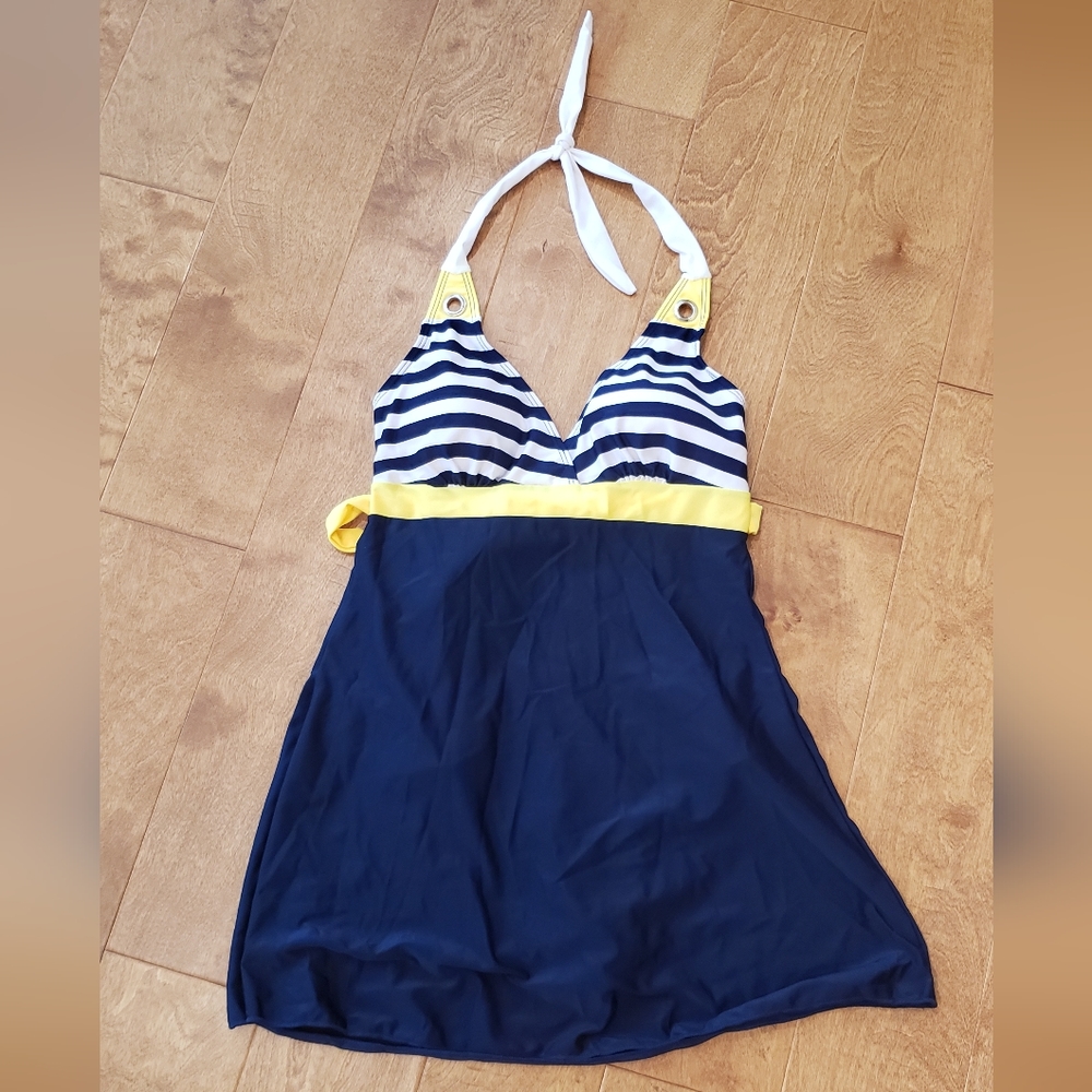 One piece swimsuit. Size L New without tags, never worn